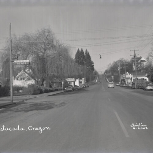 The Ford & Chevy garages were located next to each other at the bottom of Main St. where Ace Hardware & 300 Main is now located.